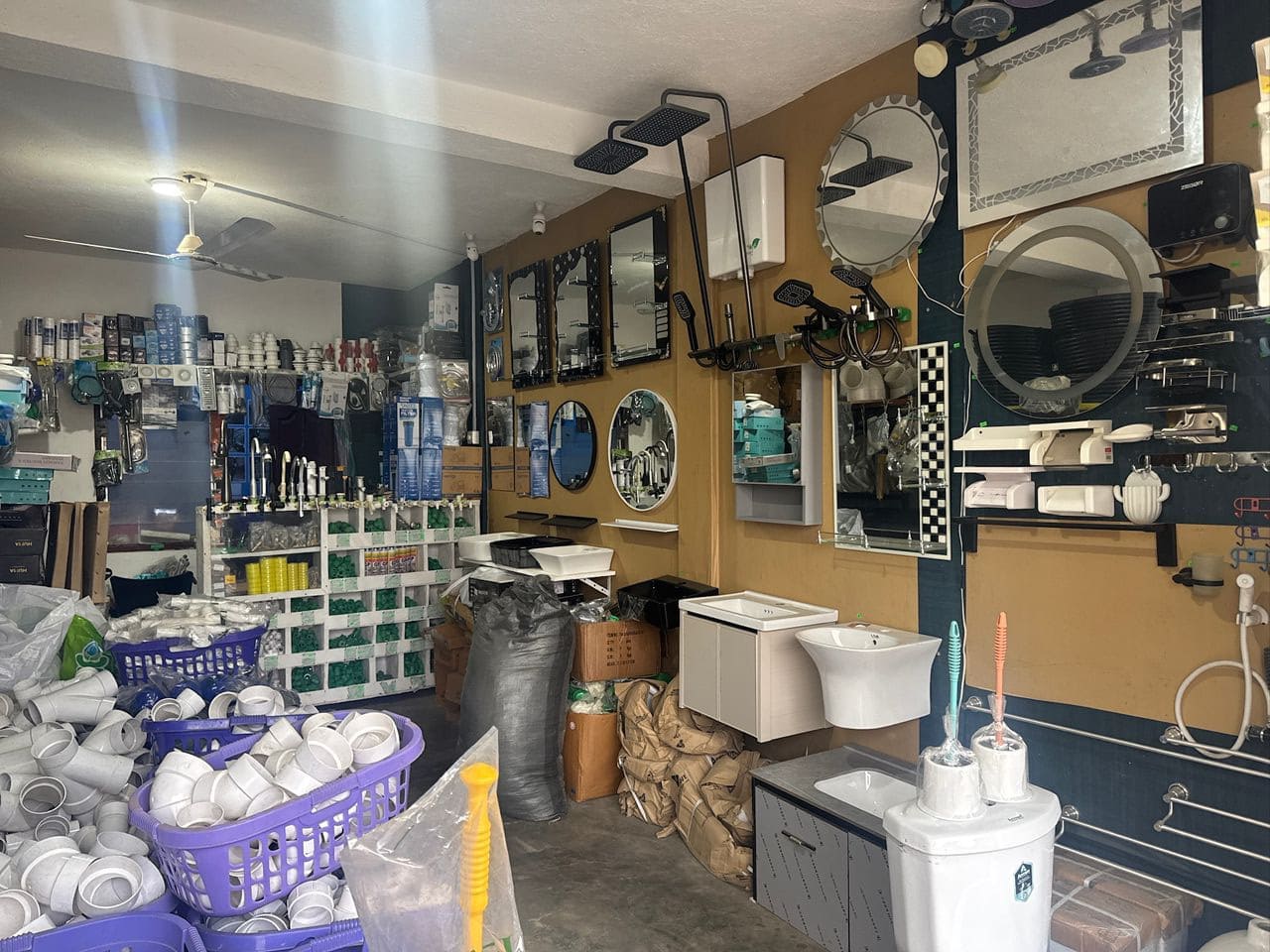 A lit plumbing Shop with all kinds of plumbing materials