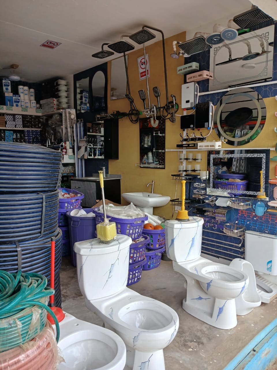White flashing toilet seats in a shop